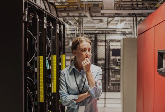 A woman in a server room
